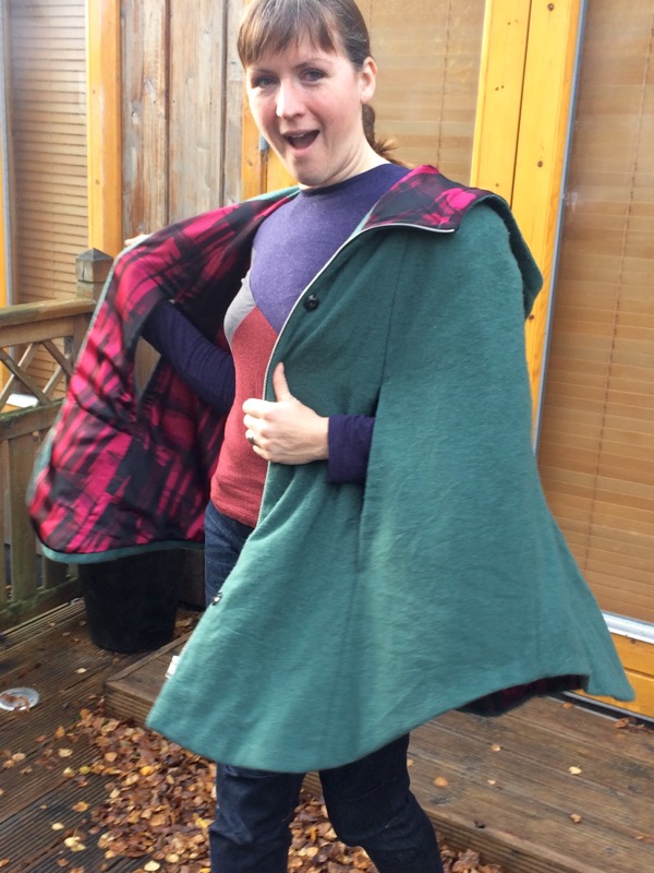A teal wool cape – FehrTrade