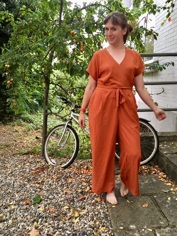 An orange Zadie jumpsuit sewn in a day FehrTrade