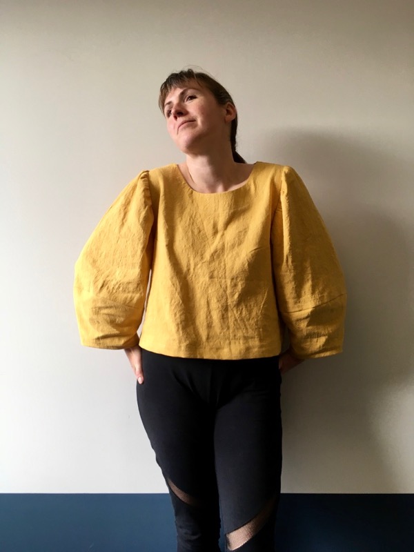 Yellow bell sleeves top by Rias