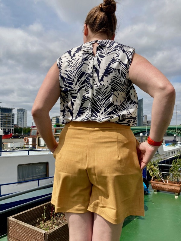 https://blog.fehrtrade.com/wp-content/uploads/2020/07/mustard-wool-shorts-back-view.jpg